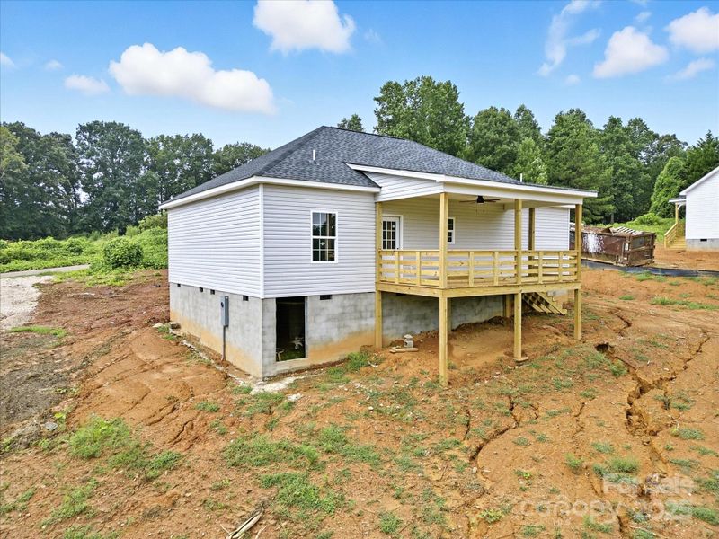 Front exterior of a new home in , Clover, SC, highlighting curb appeal (Image 17).