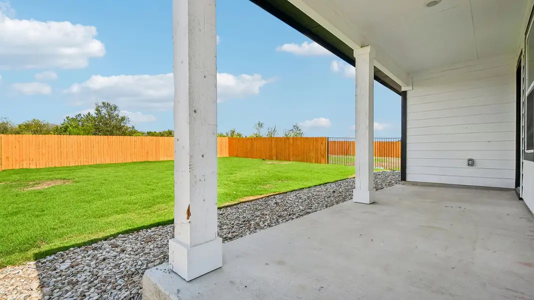 Exterior details and patio area of a home in Trails at Wildhorse, Austin (Image 18).