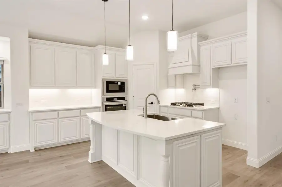 Furnished interior view inside a new home in Villages of Hurricane Creek, Anna (Image 11).