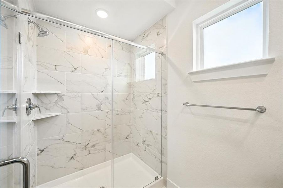 Bathroom with a marble finish shower Bathroom with a marble finish shower