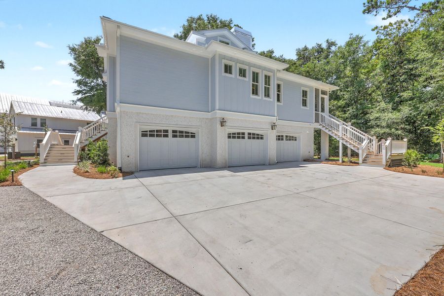 Front exterior of a new home in , Mount Pleasant, SC, highlighting curb appeal (Image 1). Front exterior of a new home in , Mount Pleasant, SC, highlighting curb appeal (Image 1).
