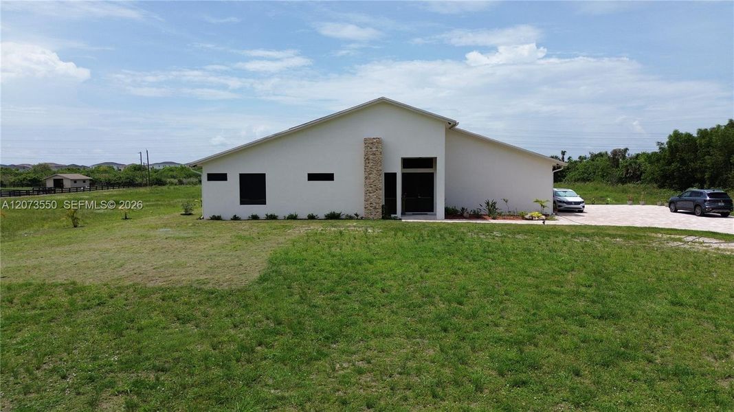 Exterior details and patio area of a home in , Loxahatchee (Image 27).