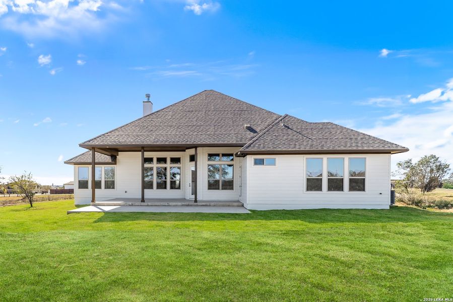 Exterior details and patio area of a home in Potranco Acres, Castroville (Image 3).
