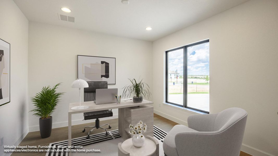 Office space with wood finished floors and recessed lighting Office space with wood finished floors and recessed lighting