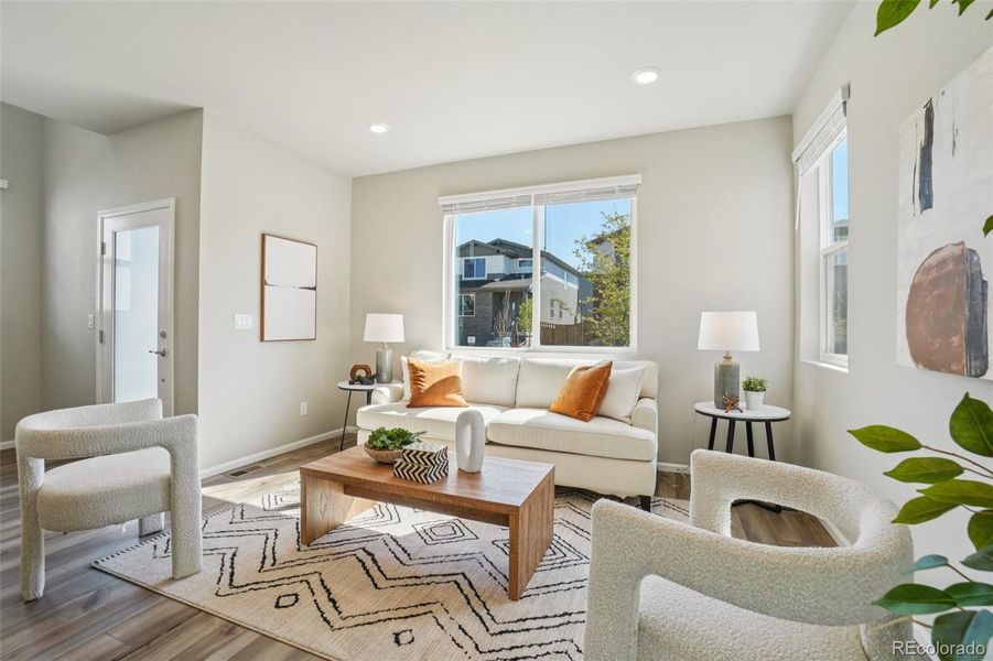 Furnished interior view inside a new home in Woodrose at Painted Prairie, Aurora (Image 7).