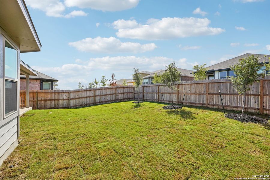 Front exterior of a new home in Comanche Ridge, San Antonio, TX, highlighting curb appeal (Image 23).