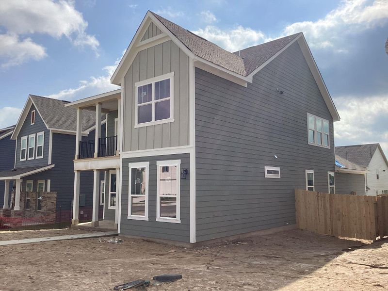 Exterior details and patio area of a home in The Cottages at Lariat, Liberty Hill (Image 8).