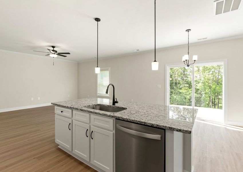 The kitchen overlooks the living area