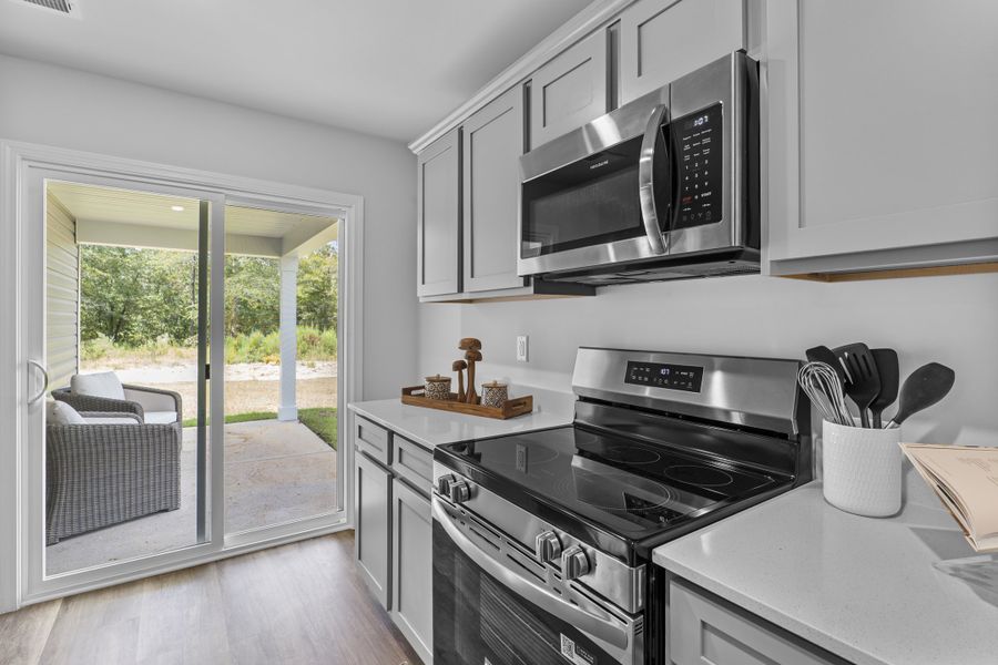 Representative furnished interior of a home built from the Magnolia by McGuinn Homes in Crystal Downs, Sumter (Image 14).
