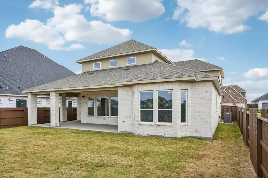 Exterior details and patio area of a home in Del Bello Lakes 60', Manvel (Image 28).