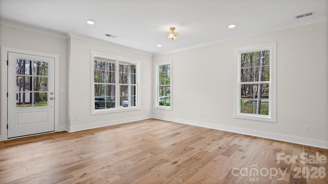 Wide Hardwoods, 9' Ceilings, Heavy Moldings, Large Windows