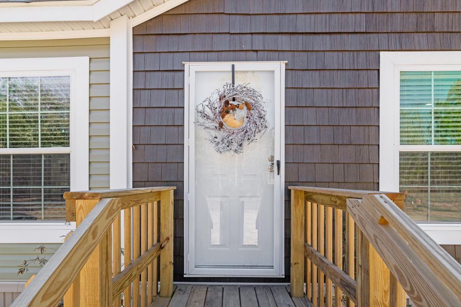 Exterior details and patio area of a home in , Cottageville (Image 25).