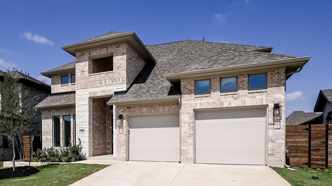 Front exterior of a new home in Juniper Springs, Lockhart, TX, highlighting curb appeal (Image 2).