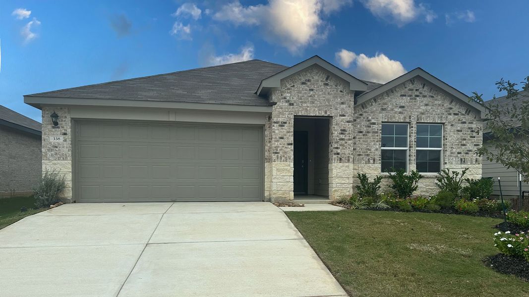 Front exterior of a new home in Arroyo Ranch, Seguin, TX, highlighting curb appeal (Image 1).