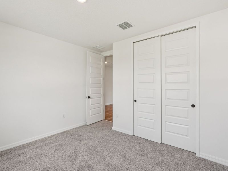Spacious, unfurnished interior of a new home in Oakfield Trails - Signature Series, Parrish (Image 8).