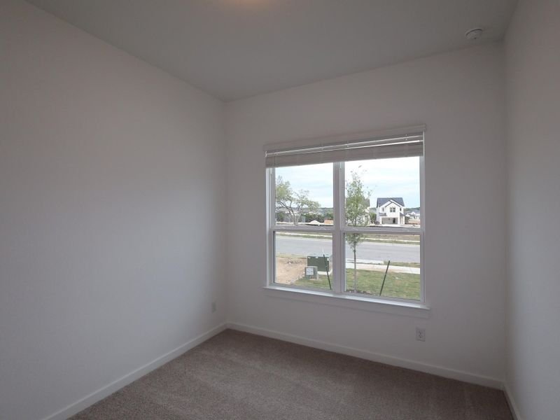Spacious, unfurnished interior of a new home in Heritage, Dripping Springs (Image 6).