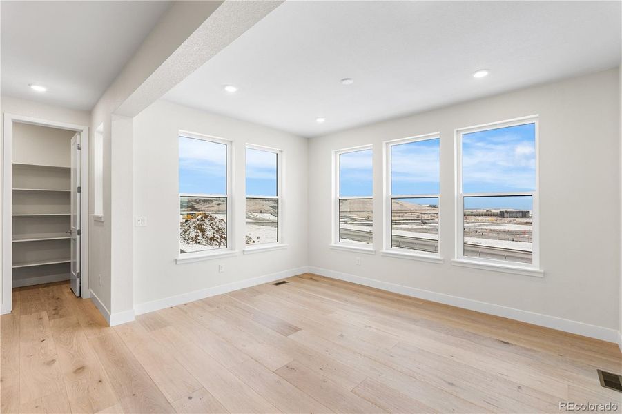 Spacious, unfurnished interior of a new home in Autograph at Lyric, Lone Tree (Image 35).