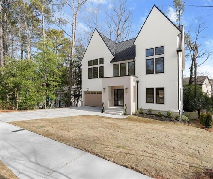 Front exterior of a new home in , Brookhaven, GA, highlighting curb appeal (Image 2). Front exterior of a new home in , Brookhaven, GA, highlighting curb appeal (Image 2).