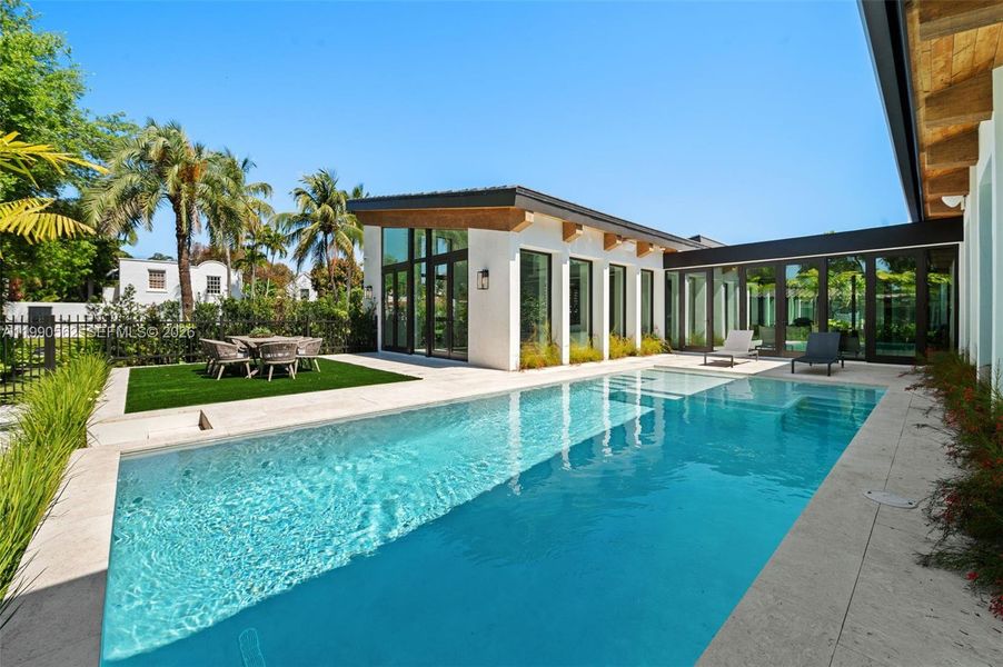 Exterior details and patio area of a home in , Coral Gables (Image 24).