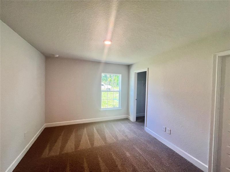 Spacious, unfurnished interior of a new home in Orange Blossom Hills, Summerfield (Image 13).