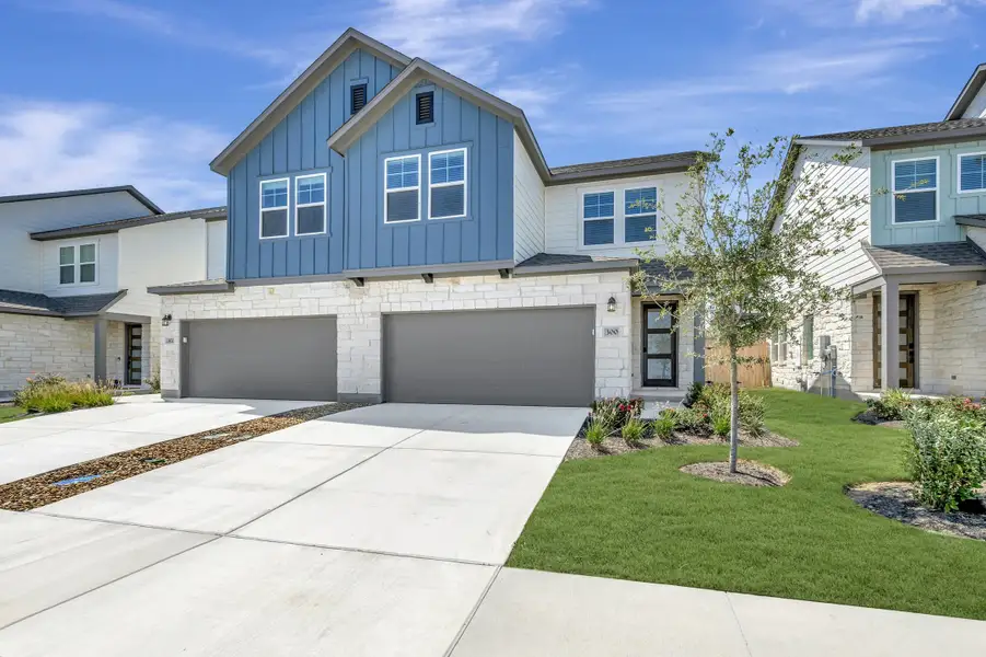 Front exterior of a new home in Park Central, Georgetown, TX, highlighting curb appeal (Image 2). Front exterior of a new home in Park Central, Georgetown, TX, highlighting curb appeal (Image 2).