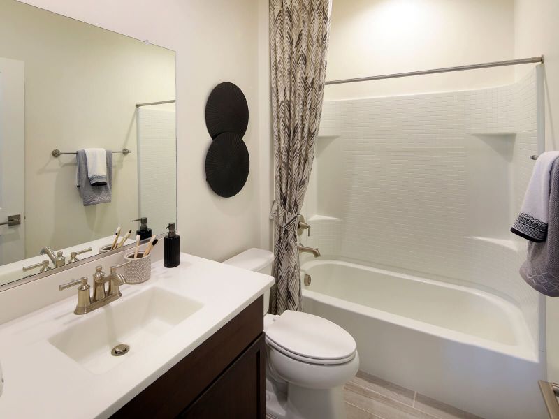 The secondary bath is conveniently located between the secondary bedrooms.