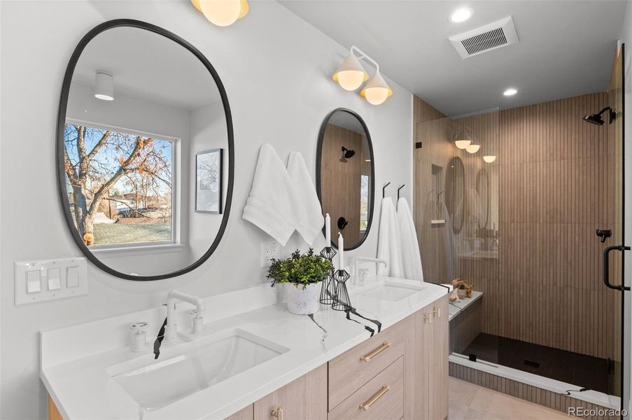 Matching quartz counters in owners bathroom