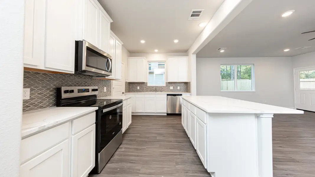 Representative furnished interior of a home built from the The Bronte - Walden on Lake Conroe by Legend Homes in Lake Conroe Area Homes, Montgomery (Image 6).