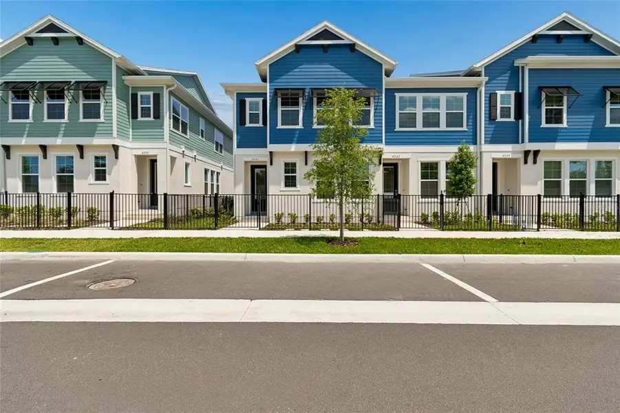 Front exterior of a new home in , Orlando, FL, highlighting curb appeal (Image 1). Front exterior of a new home in , Orlando, FL, highlighting curb appeal (Image 1).