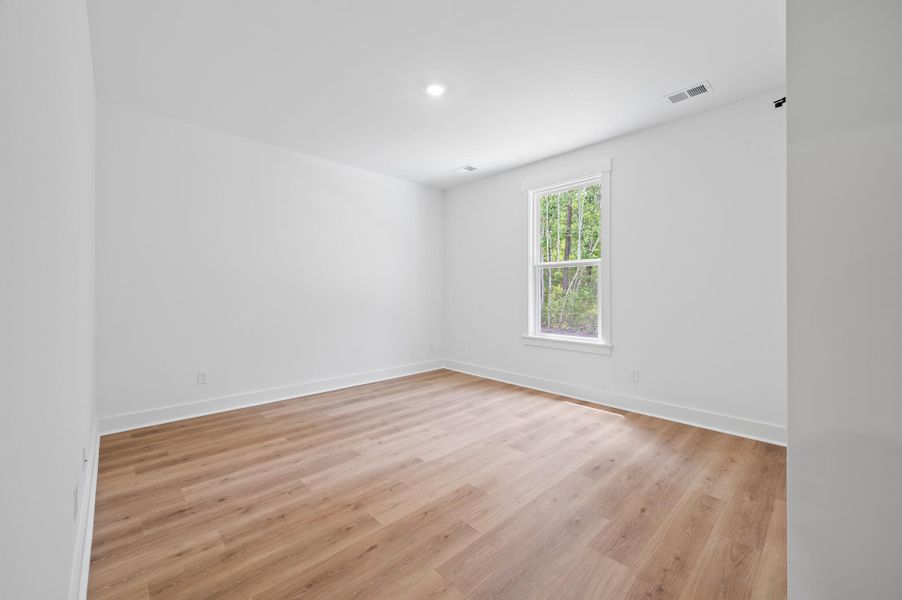 Spacious, unfurnished interior of a new home in Charleston County Homes, Awendaw (Image 16).