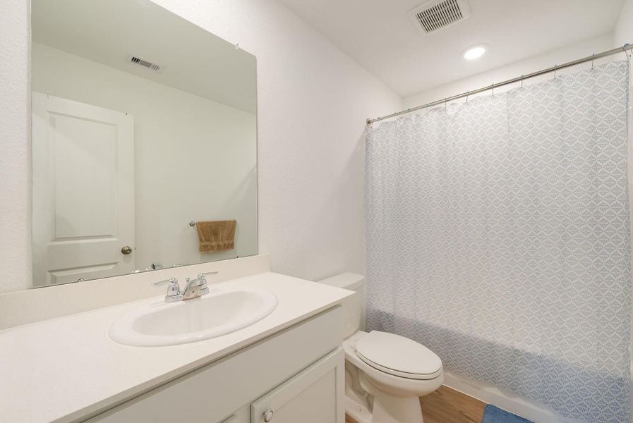 Furnished interior view inside a new home in Ladera Trails, Conroe (Image 20).