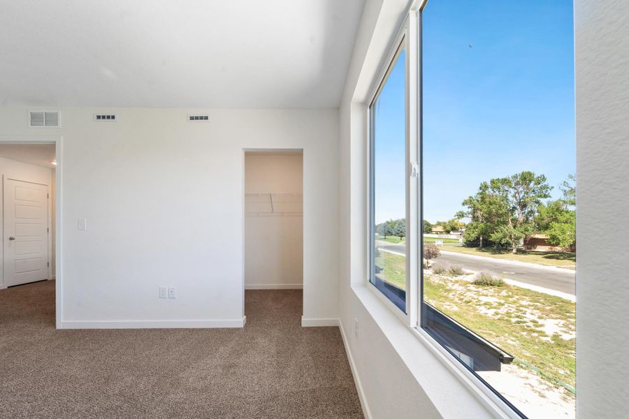 Spacious, unfurnished interior of a new home in Conestoga, Ault (Image 19).