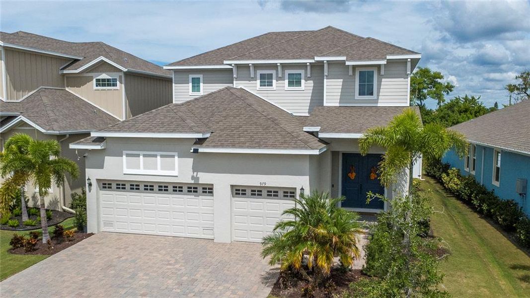 Front exterior of a new home in , Apollo Beach, FL, highlighting curb appeal (Image 21). Front exterior of a new home in , Apollo Beach, FL, highlighting curb appeal (Image 21).
