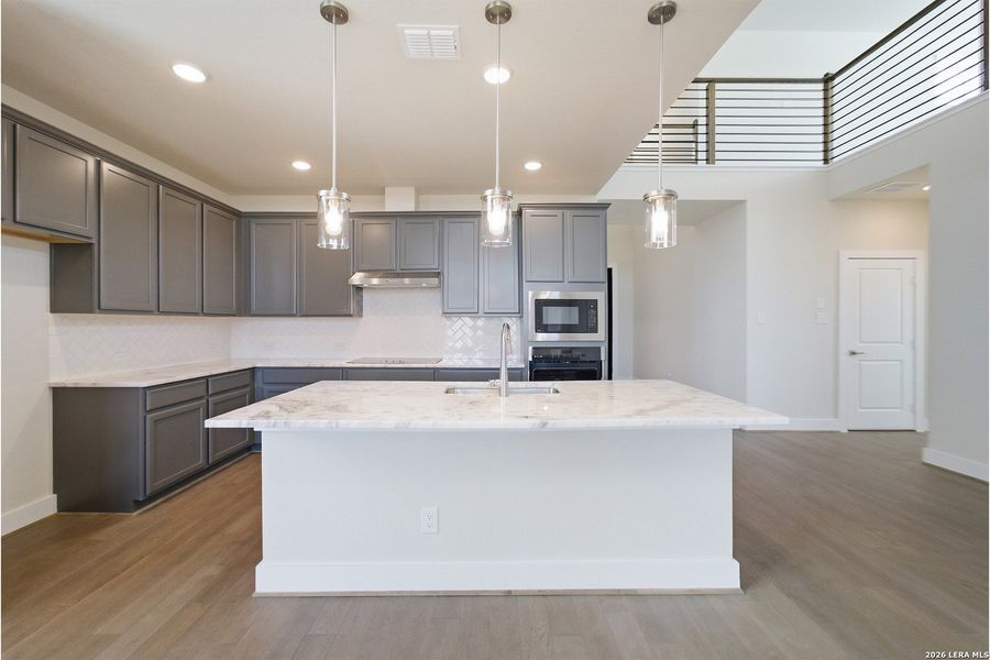 Furnished interior view inside a new home in The Woodlands at Medina Hills, Mico (Image 17).
