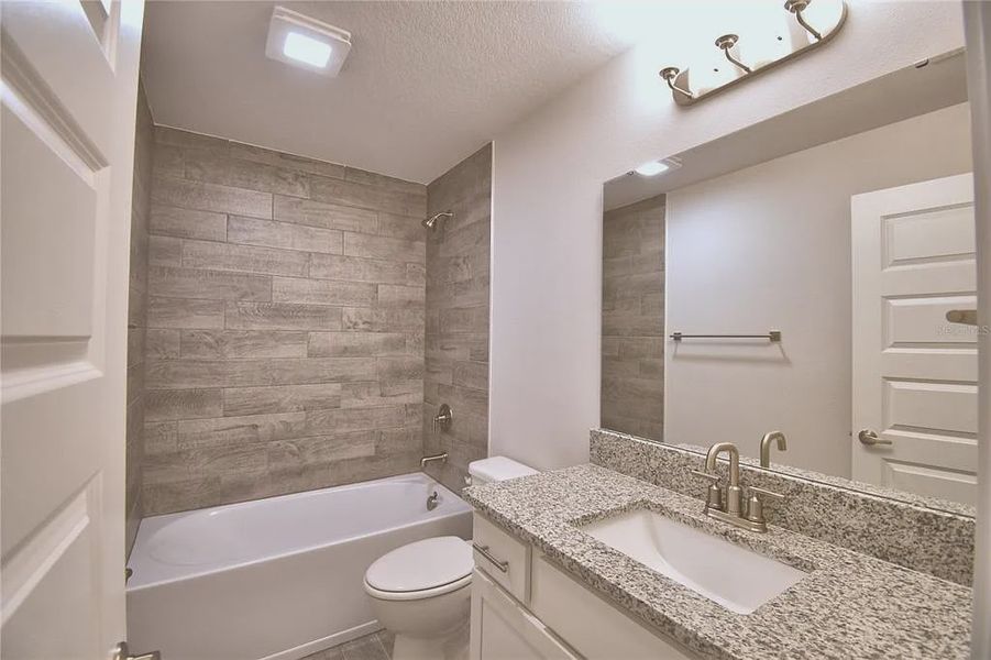 Furnished interior view inside a new home in Lake Juliana Estates, Auburndale (Image 12).