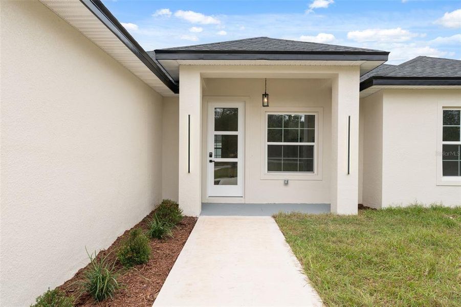 Exterior details and patio area of a home in , Ocala (Image 23).