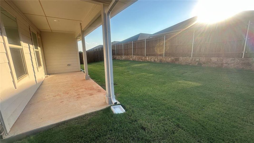 Exterior details and patio area of a home in Sandy Beach, Azle (Image 3).