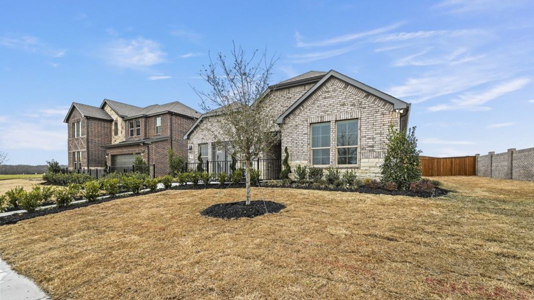 Representative exterior photo of a completed home built from the Vail by D.R. Horton in Madera, Royse City, TX (Image 26). Representative exterior photo of a completed home built from the Vail by D.R. Horton in Madera, Royse City, TX (Image 26).