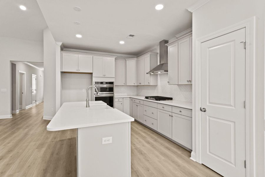 Furnished interior view inside a new home in Tidewater at Lakes of Cane Bay, Summerville (Image 8).