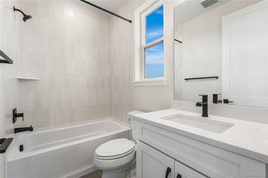 Furnished interior view inside a new home in Autograph at Lyric, Lone Tree (Image 33).