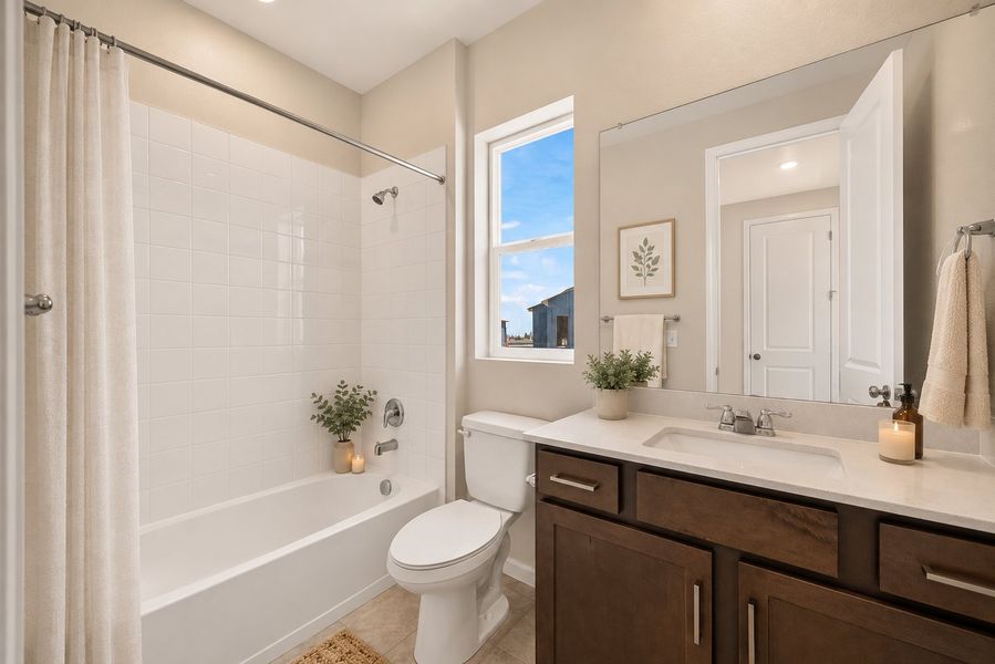 Furnished interior view inside a new home in Trailstone, Arvada (Image 10).