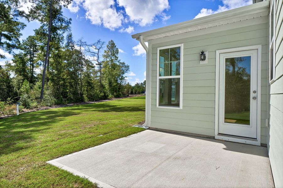 Exterior details and patio area of a home in Grand Park, Leland (Image 2). Exterior details and patio area of a home in Grand Park, Leland (Image 2).
