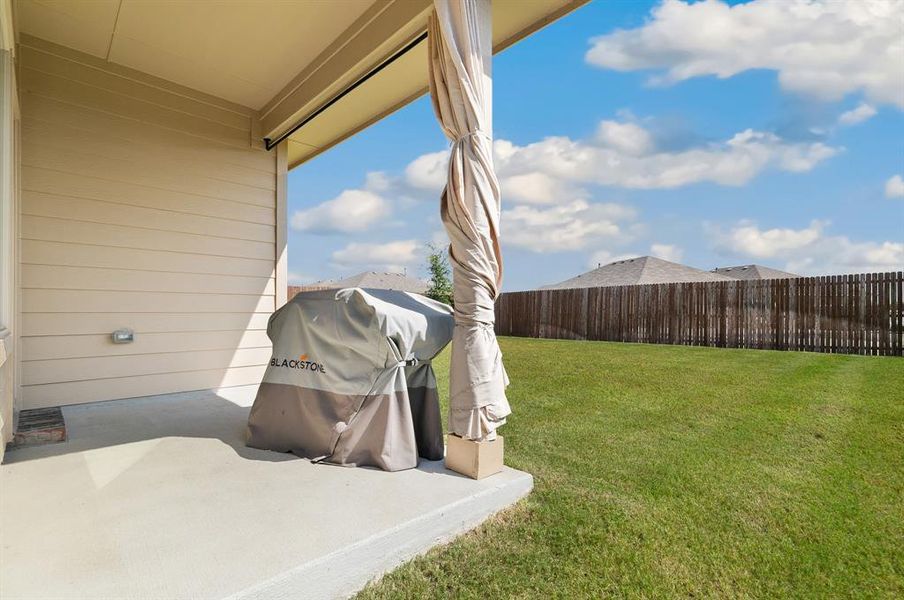 View of yard with a patio