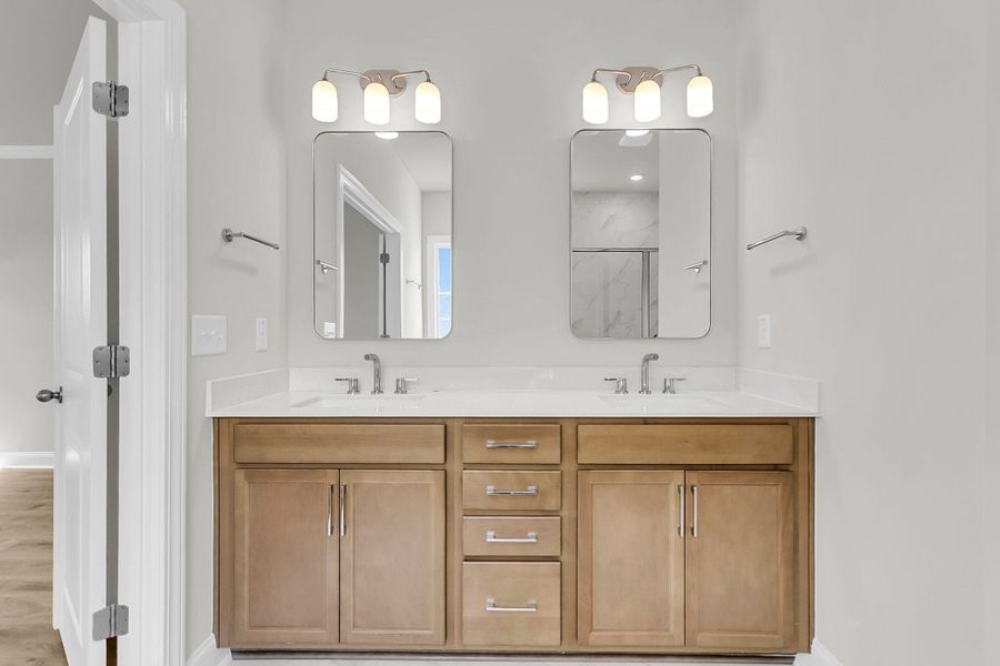 Furnished interior view inside a new home in Tidewater at Lakes of Cane Bay, Summerville (Image 13).