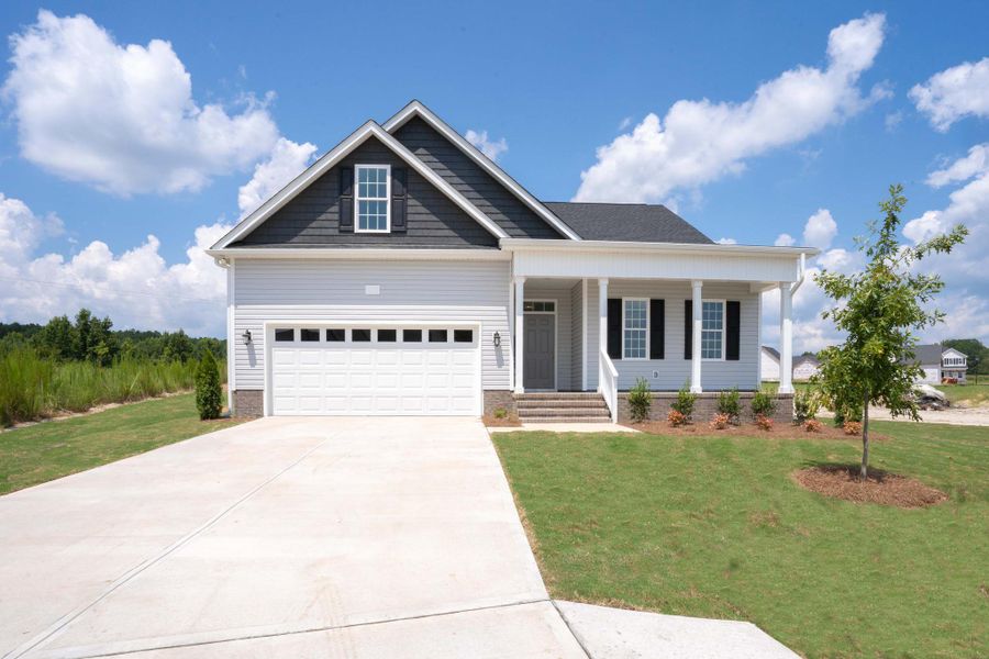 Representative exterior photo of a completed home built from the Hogan by RiverWILD Homes in Maggie Way, Wendell, NC (Image 27). Representative exterior photo of a completed home built from the Hogan by RiverWILD Homes in Maggie Way, Wendell, NC (Image 27).