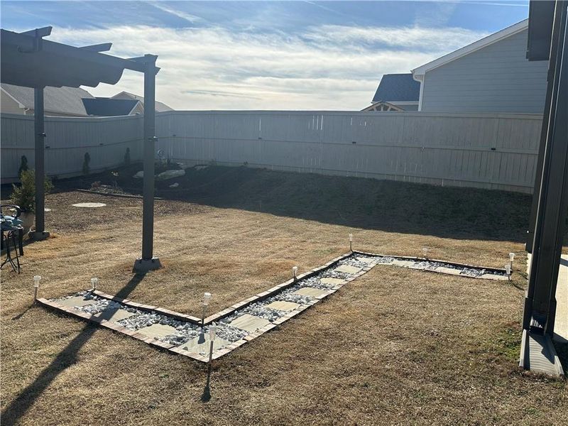Exterior details and patio area of a home in , Homer (Image 31). Exterior details and patio area of a home in , Homer (Image 31).