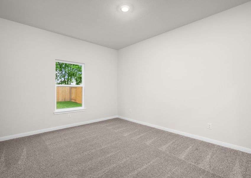 The master bedrooms is spacious and has a large window. The master bedrooms is spacious and has a large window.