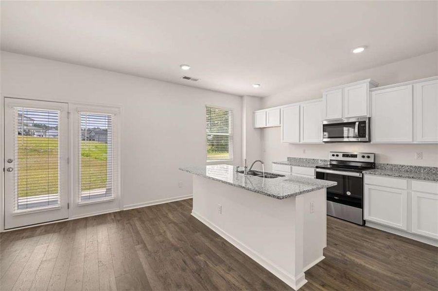 Furnished interior view inside a new home in Champion's Run, Lithonia (Image 5).