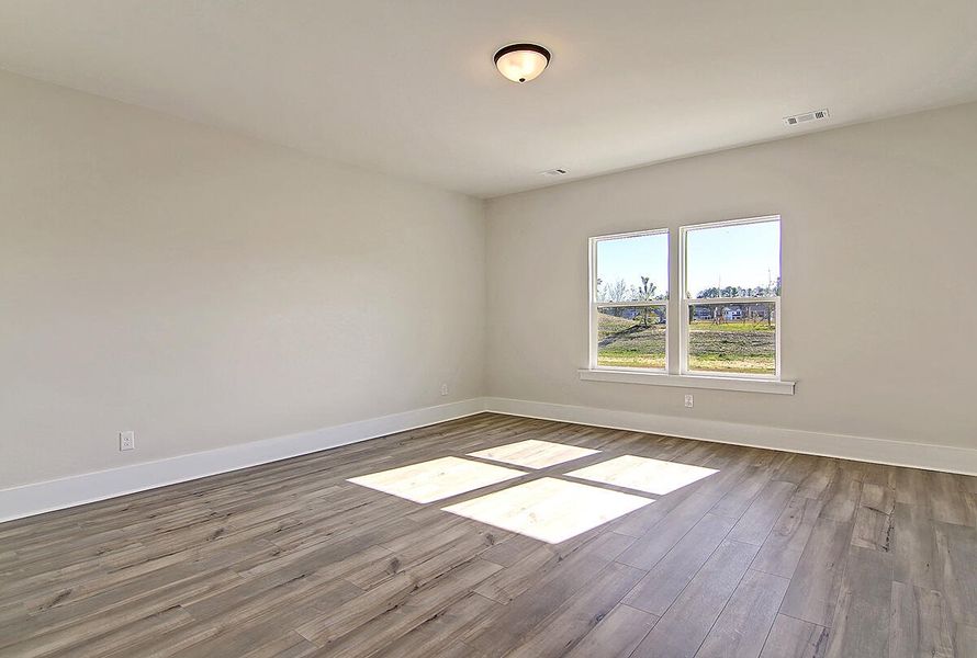 Spacious, unfurnished interior of a new home in Watson Hill, Summerville (Image 21).