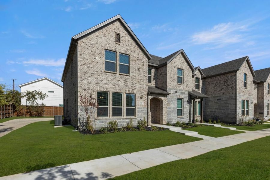 Representative exterior photo of a completed home built from the Caddo by Impression Homes in Timber Ridge, Corinth, TX (Image 2). Representative exterior photo of a completed home built from the Caddo by Impression Homes in Timber Ridge, Corinth, TX (Image 2).